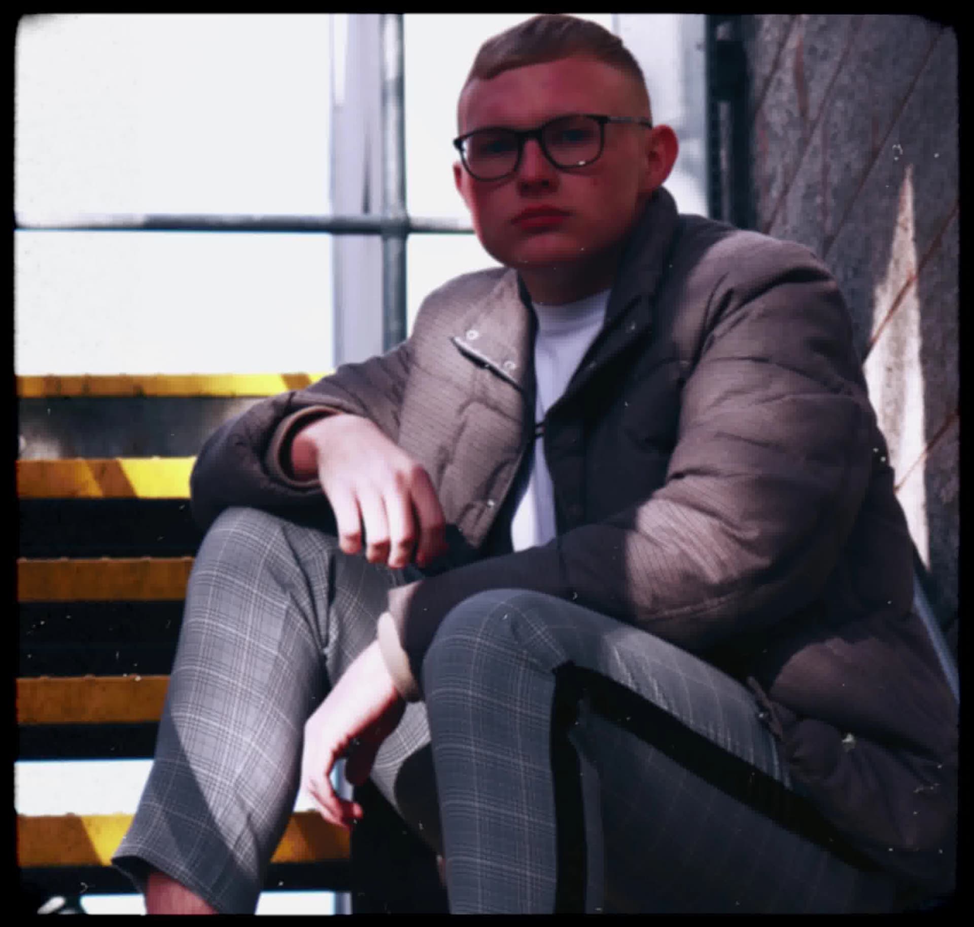 Vintage, film-like photography style with muted colors, soft focus, heavy grain, and black rounded borders, evoking a nostalgic, documentary feel.